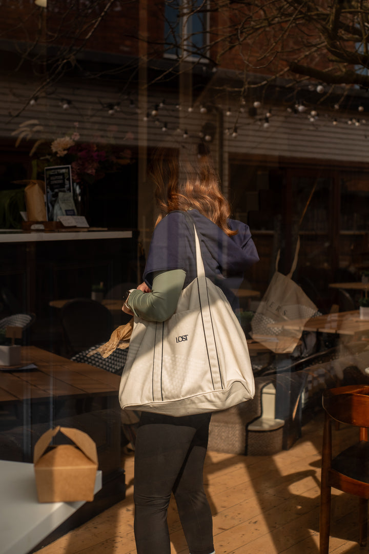 Cream canvas Court Tote bag with pocket and embroidery by LMC