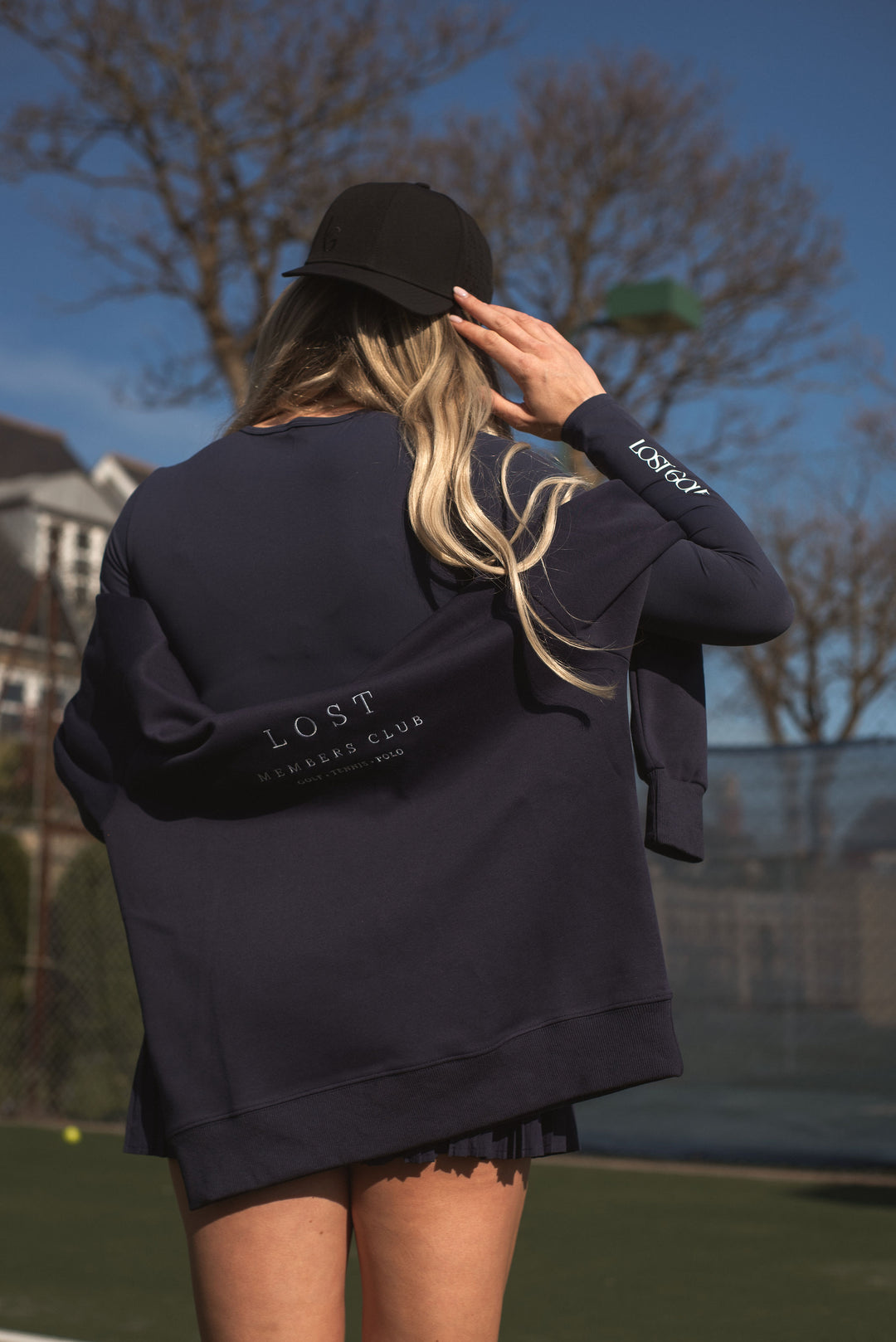 Breathable unisex navy jumper for golf, tennis, or everyday wear