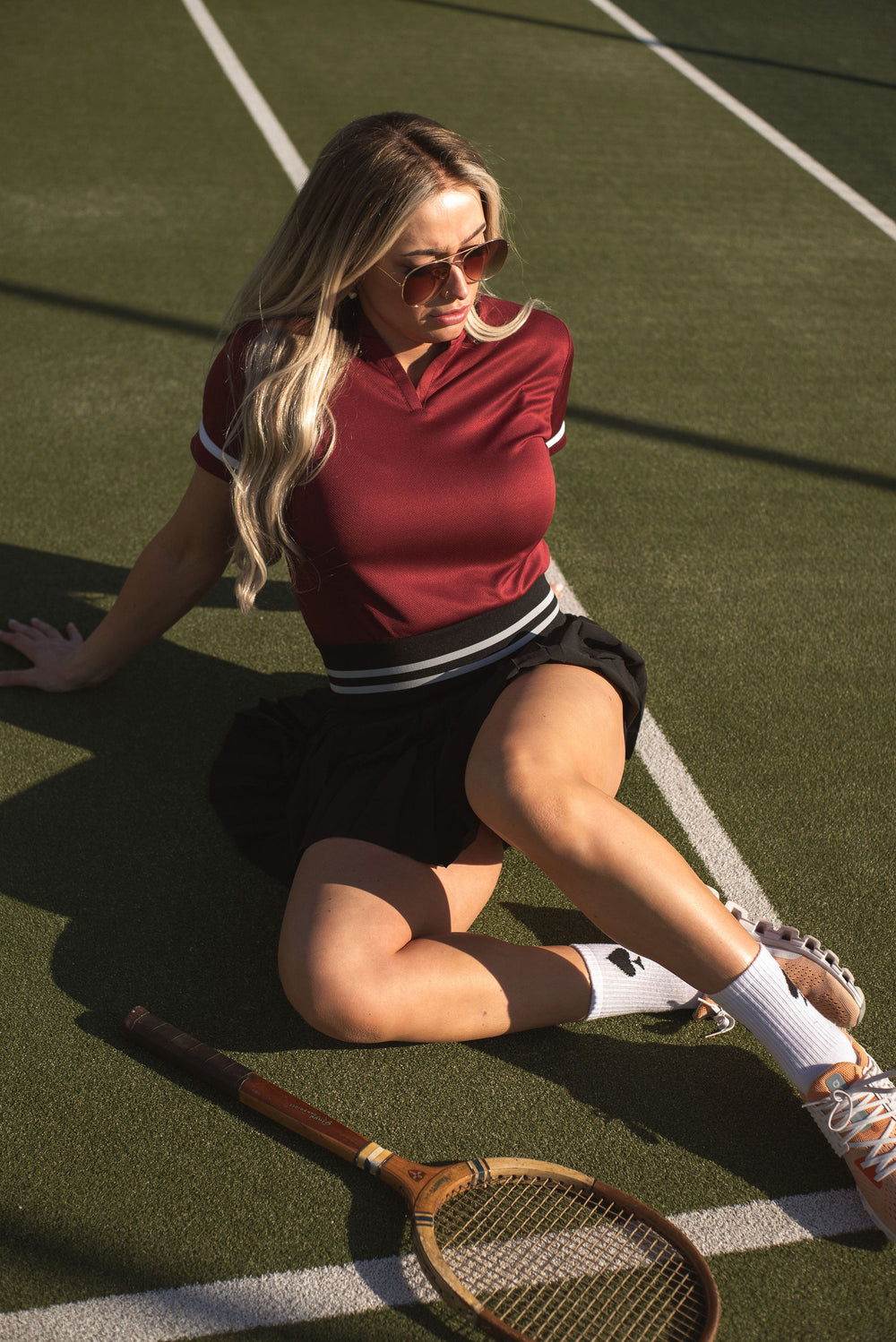 Quick-dry burgundy polo shirt for women’s tennis and golf