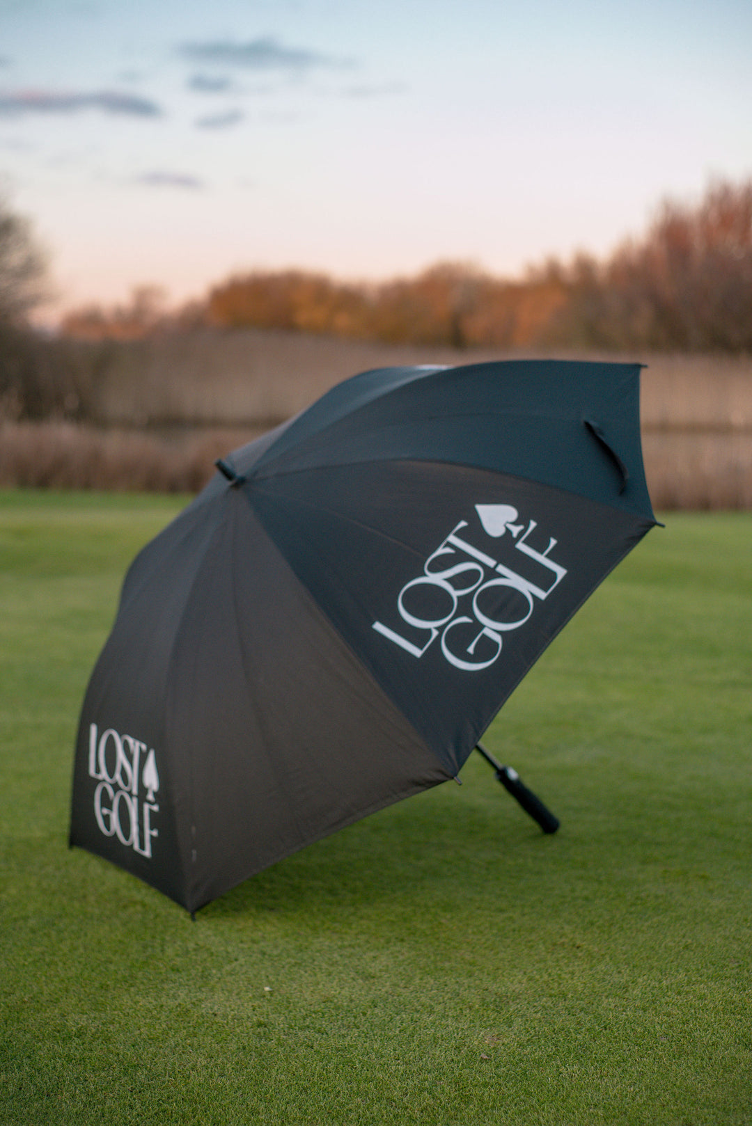Wind-resistant golf umbrella with large canopy by Lost Members Club